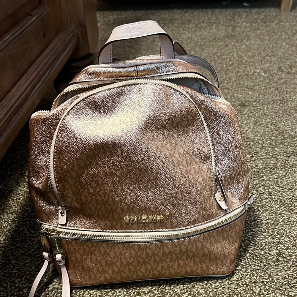 MK back pack purse Rose Gold. Never used ..